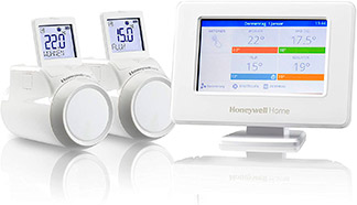 termostato honewell home blanco con dos vávulas termostáticas blancas
