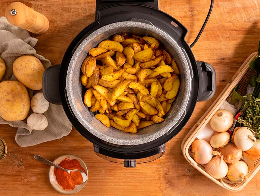 cocinando patatas con una Olla GM