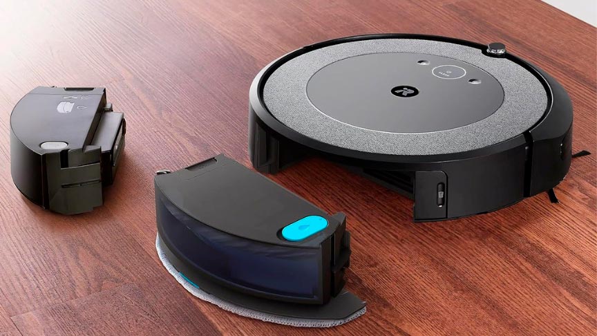 robot aspirador Roomba en color gris con el depósito fuera